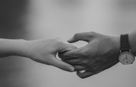 A couple holding hands