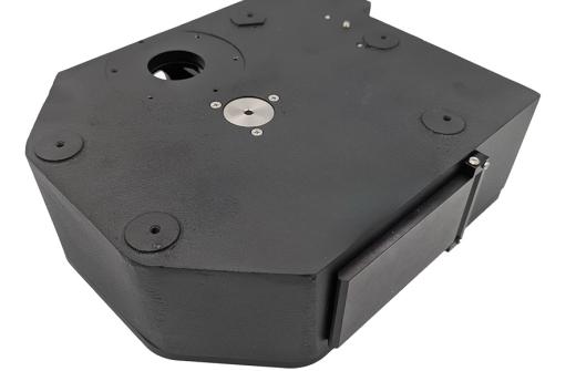 A black box-shaped device for switching filter cubes used in fluorescence microscopy. 
