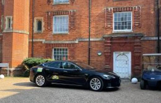 Electric Tesla Model S airport transfer as an alternative to Cambridge airport parking