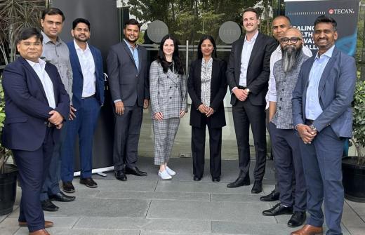 Mukta Acharya, EVP and Head of Tecan's Life Science Business, celebrates the India office opening with HQ and Tecan India team members