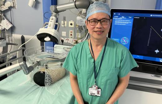 Dr Teik Choon See, consultant interventional radiologist at Addenbrooke’s, in front of the new histotripsy machine