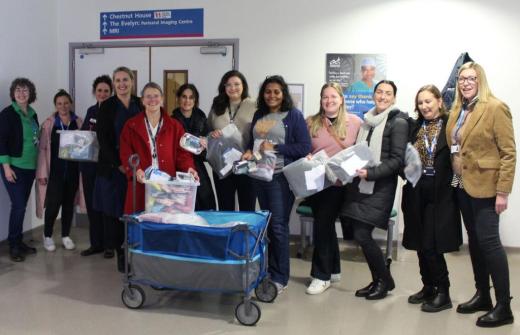 Illumina, nursing and ACT staff deliver care packs to Addenbrooke's for families admitted with children in an emergency situation
