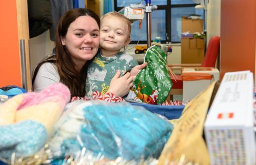 One of the children with the present they picked for their mum