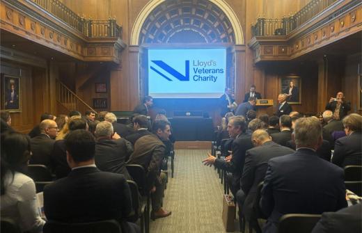 Lloyd's Veretans Charity logo on-screen at launch event