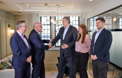 Steven Davidson and Martin Clapson shake hands, as Price Bailey's Mayfair office