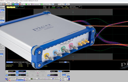 A PicoScope 9404A-25 oscilloscope in front of a dark mode screen shot of  the PicoSample software 