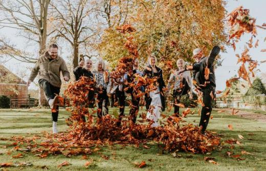 The Sandon Manor team kicking leaves