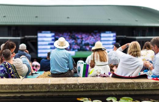 Guests sit outside at Wimbledon 