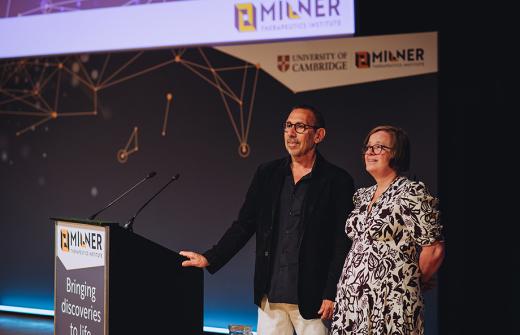 Two people standing on a stage