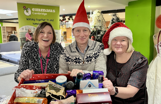 Donna, Peter and Hannah with a box of gifts