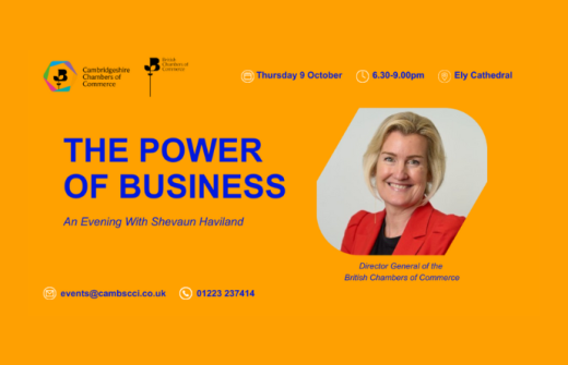 Promotional poster for the Cambridgeshire Chambers of Commerce event titled The Power of Business: An Evening With Shevaun Haviland. The poster has an orange background with blue text. On the right, there is a photo of Shevaun Haviland, smiling and wearing a red blazer. She is identified as the Director General of the British Chambers of Commerce.  Event details are displayed across the top:  Date: Thursday 9 October  Time: 6.30–9.00pm  Location: Ely Cathedral  At the bottom, contact details are shown:  Ema