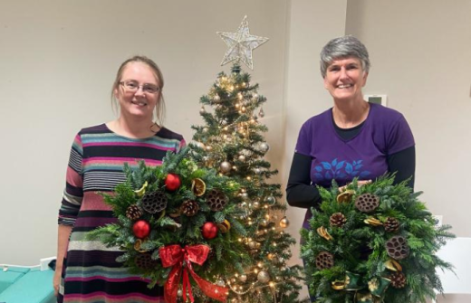 The charity holds festive events like wreath-making for local families 