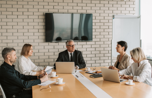 A business meeting taking place in a meeting room