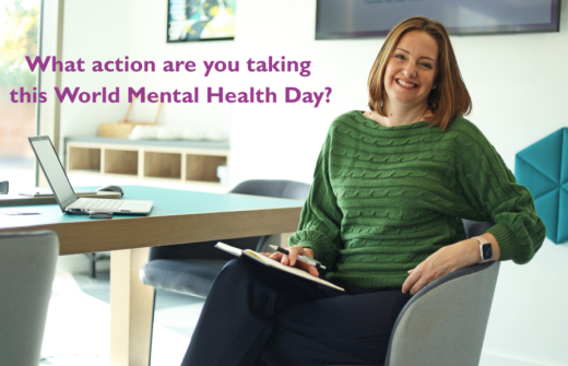 Claire Harris from Promote Mental Health sat at a desk