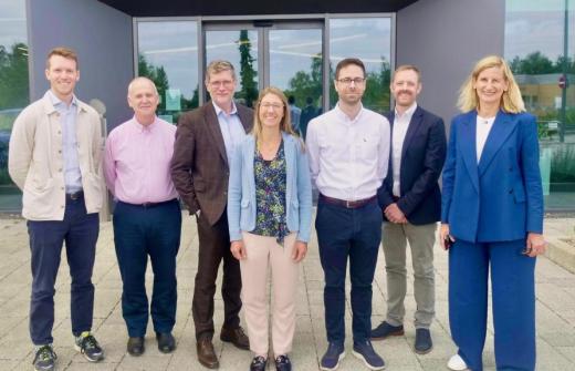 Xampla investors and founders posing for a photograph outside the Cambridge headquarters.