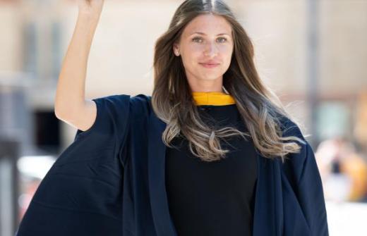 female ARU student on graduation day