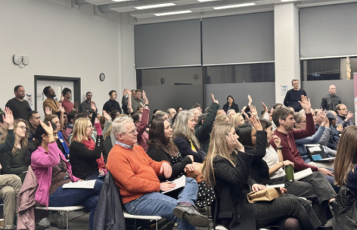 people sitting in a hall