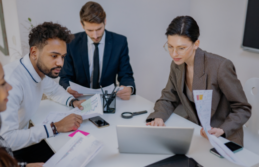 Financial adviser discussing risk tolerance questionnaire with client