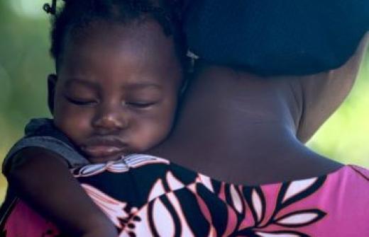 Woman with child in developing world
