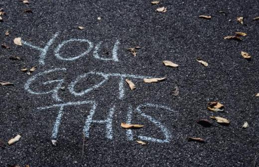 tarmac with the words written in chalk 'you got this'