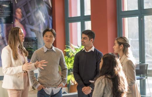 Delegates networking at Cambridge Judge Business School's Wo+Men's Leadership Conference.