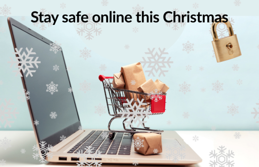 shopping trolley full of gifts sitting on a laptop