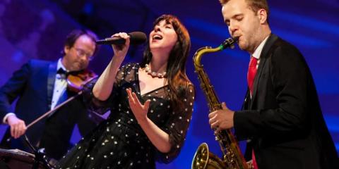 Jazz musicians playing music and singing
