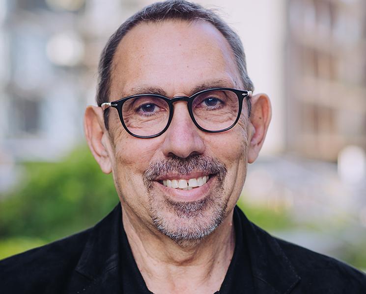 Headshot of Sir Tony Kouzarides