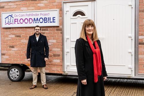 Ox-Cam Pathfinder Project’s PFR Business Advisor, Matt Tandy, and Residential Advisor, Mary Dhonau OBE, outside the Floodmobile