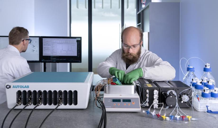 An engineer working on a medical device and ensuring regulatory compliance