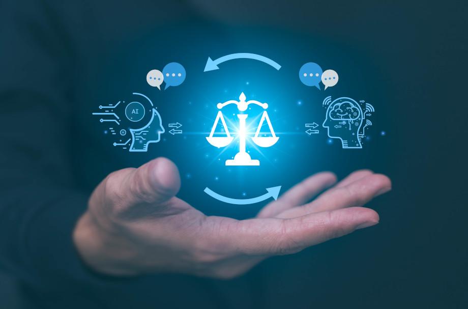 A digital illustration of a hand holding a balanced scale with a holographic human profile to one side and an AI profile to the other, with networks flowing between them to signify AI ethics, regulation and compliance. 