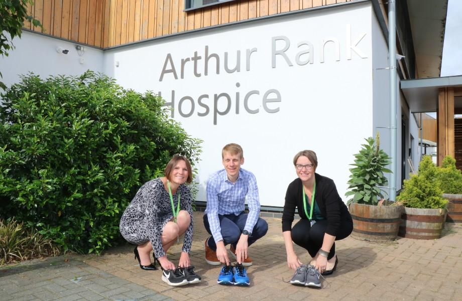 Arthur Rank Hospice Charity runners outside Hospice with trainers 
