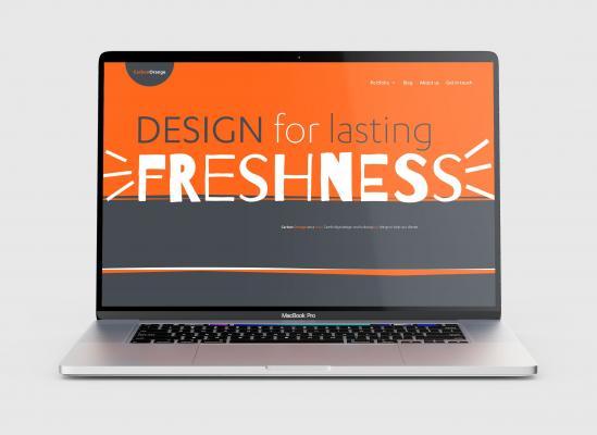 Laptop showing Carbon Orange website homepage with text Design for lasting freshness