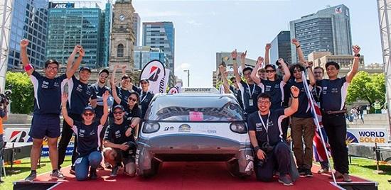 The CUER team with Helia at the close of the 2019 Bridgestone World Solar Challenge.  Credit: Cambridge University Eco Racing (CUER)
