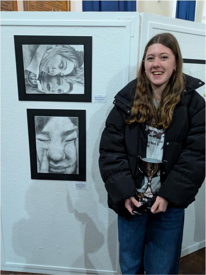 Lower Sixth pupil Charly S and her winning piece, Girl in the Mirror. 
