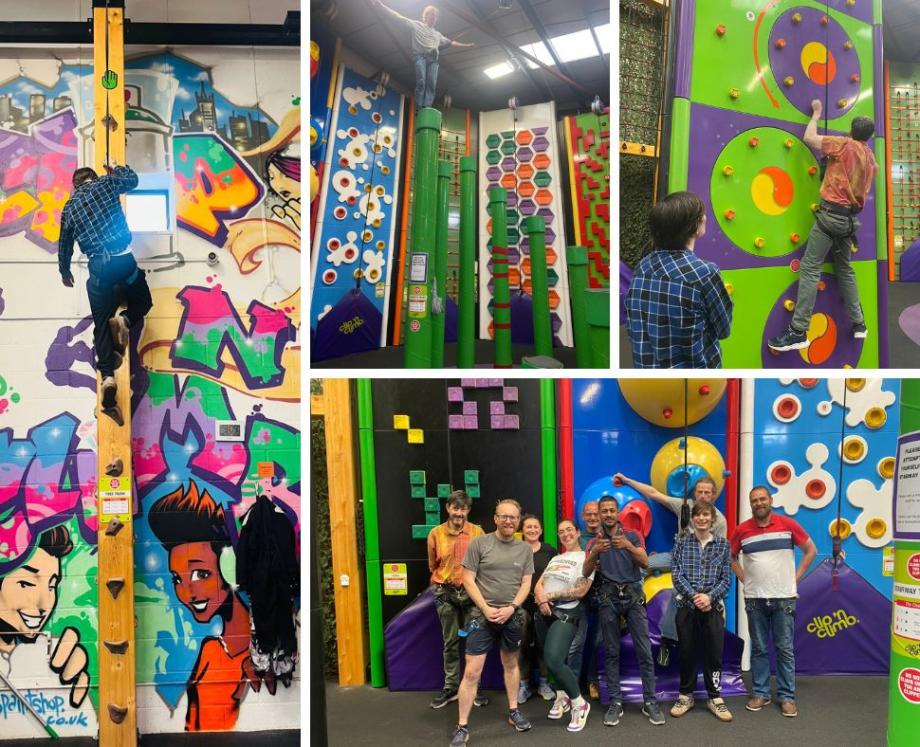 Team of staff and people supported by Wintercomfort climbing at the Clip 'n Climb arena.