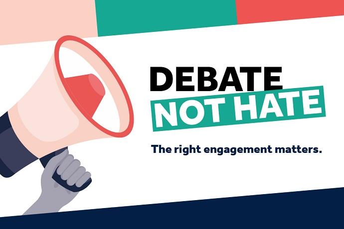 Debate not hate sign