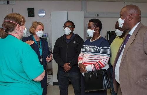 Dr Rowan Burnstein, Neuro Critical Care Unit (NCCU) Consultant (second from left) shows Dr Diana Atwine (fourth from left) around the NCCU