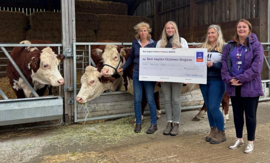 EACH Senior Community Fundraiser Victoria Goldsmith (right) receives a cheque from Pymoor Stockmans Club
