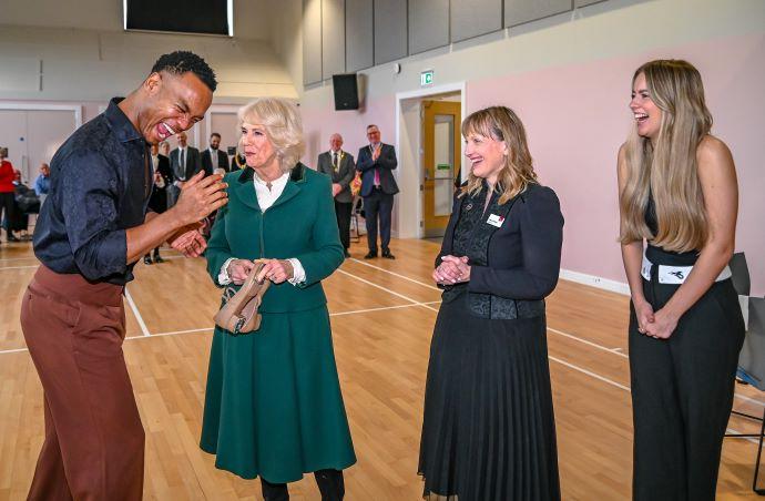Majesty The Queen makes a royal visit to Cambridge Community Centre with Johannes Radebe