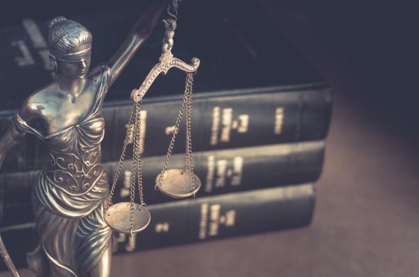 Lady Justice with law books