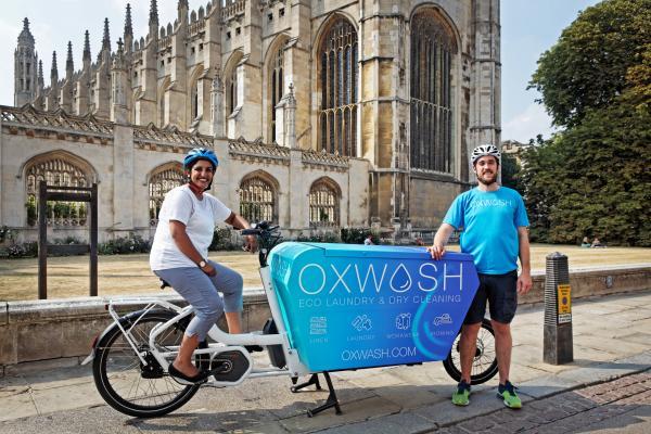 Oxwash e-cargo bike and riders