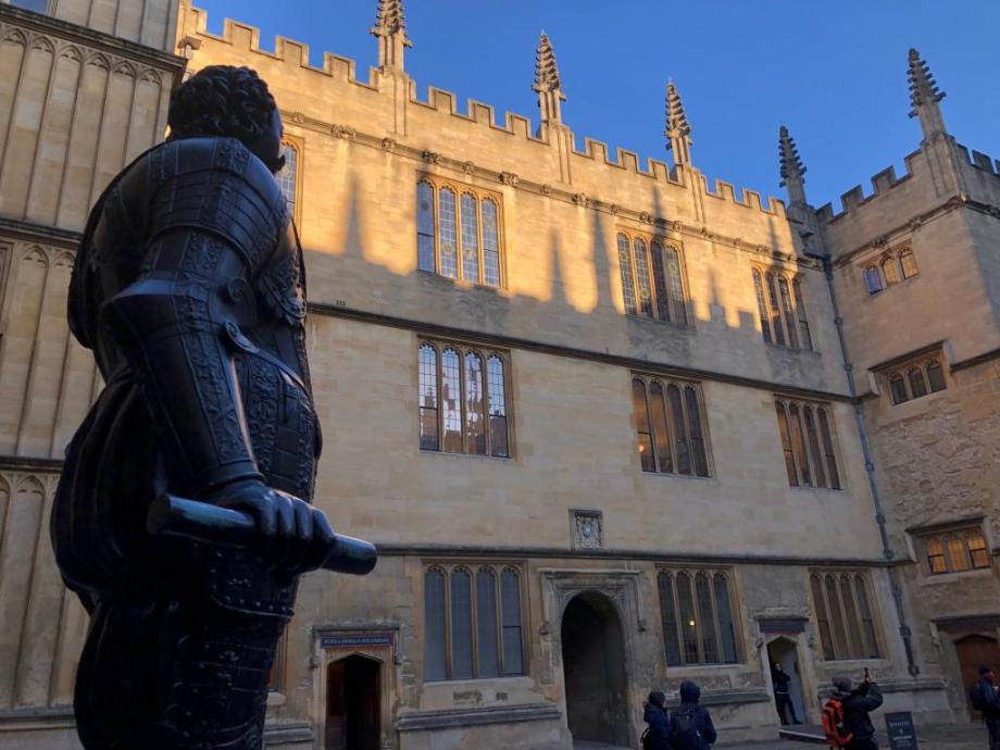 Statue in front of historic buildings in Oxford