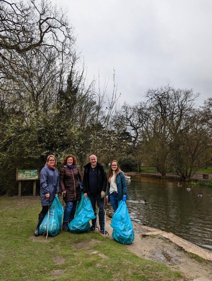 volunteers litter picking in Cambridge local park