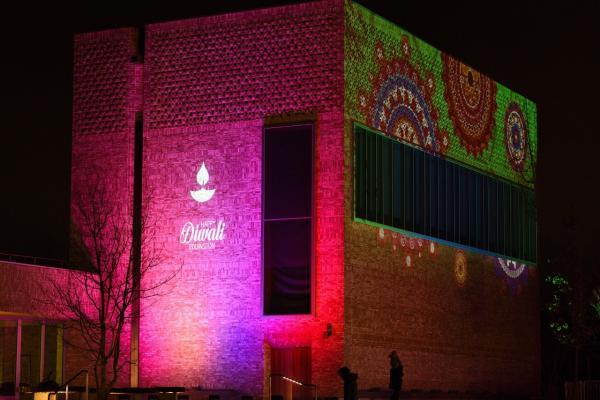 Storey's Field Centre lit up to celebrate Diwali at Eddington/ Image credit:  Phil Mynott. 