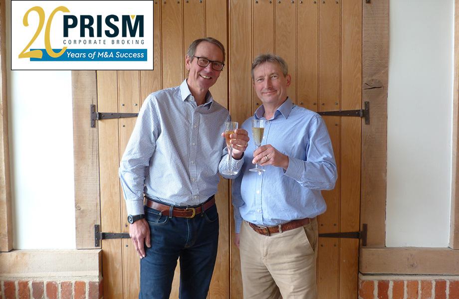 Prism's owners Peter and Robert, celebrate 20 years with champagne