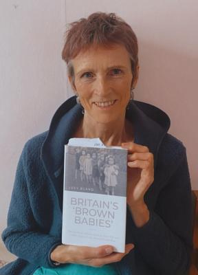Professor Lucy Bland with her book