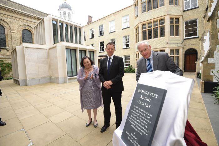 R-L His Royal Highness unveiling the plaque with Vice-Master Daniel Tyler and Sally WongAvery