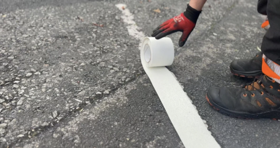 Thermoplastic line marking Roll being rolled out in preparation to be applied with heat