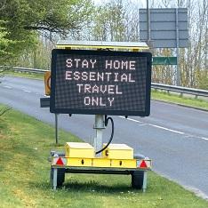 Stay home road sign